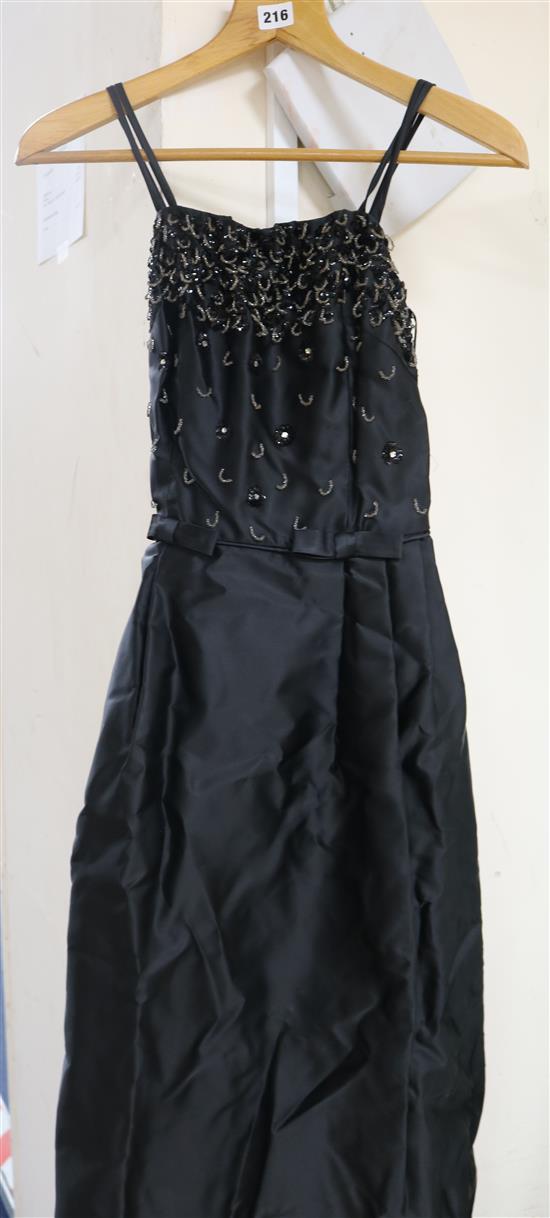 A Blanes of London vintage ball gown, black silk with bead and sequin decoration to bodice,